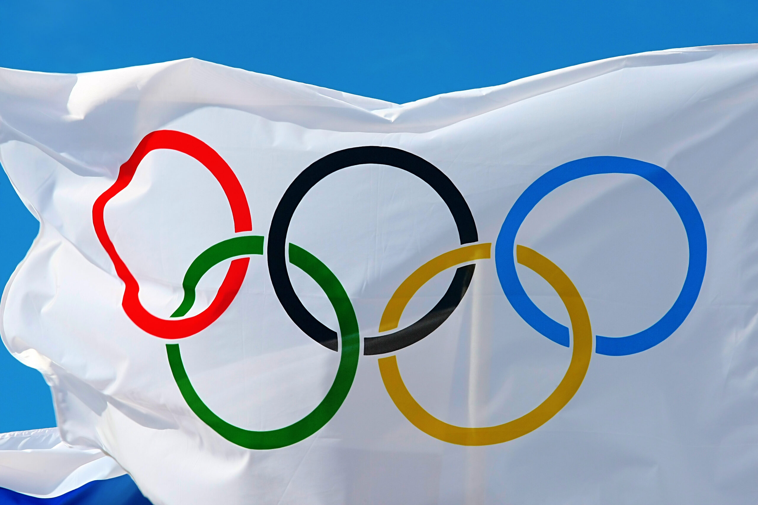 Купить ои. Флаг Олимпийских игр 1914. Олимпийские игры Олимпийский флаг. Олимпийские игры 2032. Олимпийский флаг Российской Федерации.