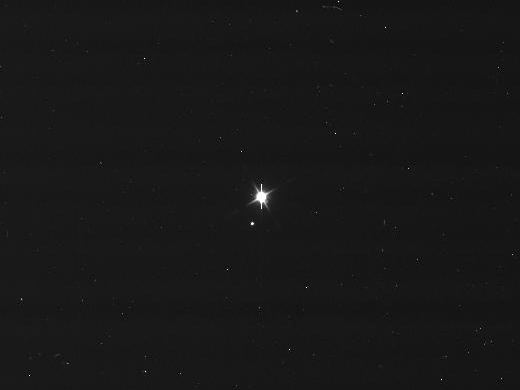 Terra şi Luna fotografiate de pe sonda Cassini