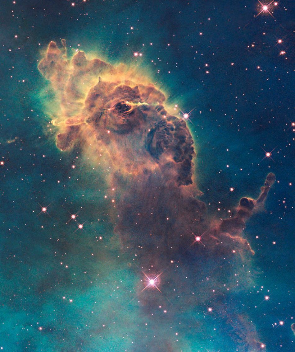 Nebuloasa Carina, fotografiată de telescopul spaţial Hubble. Nebuloasele sunt nori interstelari de praf cosmic şi gaze ionizate, în care se formează stelele.